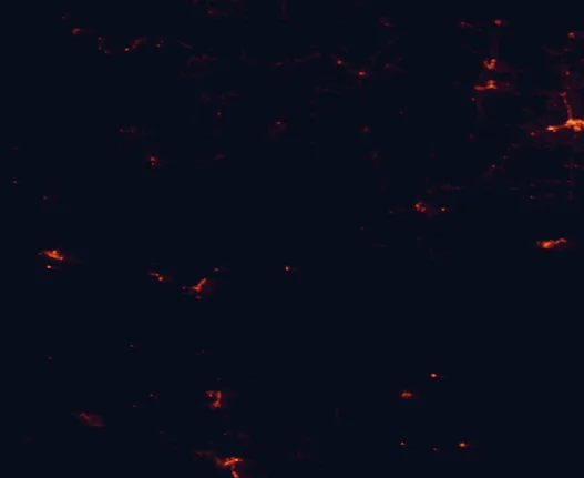 Satellite night-light map of the 100 km around Petrified Forest National Park, with Winslow and Show Low marked