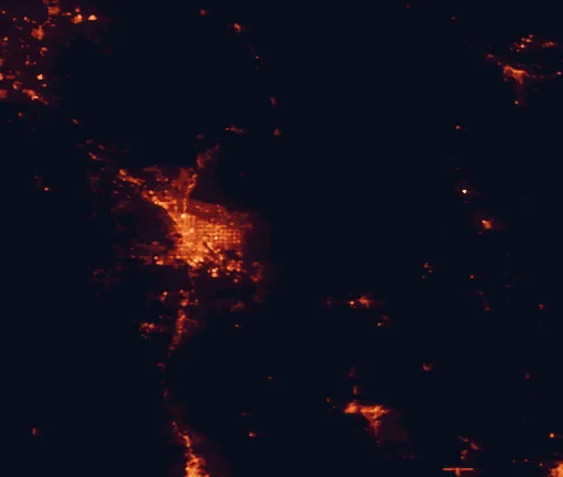 Satellite night-light map of the 100 km around Saguaro National Park, with Tucson, Casas Adobes and Catalina Foothills marked