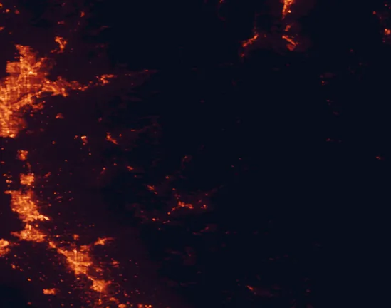 Satellite night-light map of the 100 km around Calaveras Big Trees State Park, with Stockton, Modesto and Elk Grove marked
