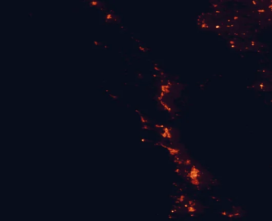 Satellite night-light map of the 100 km around Cayucos State Beach, with Santa Maria, San Luis Obispo and Atascadero marked