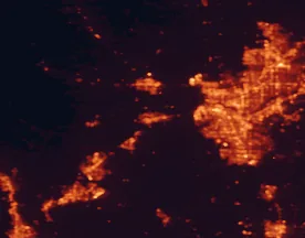 Satellite night-light map of the 50 km around Davis, with Sacramento, Elk Grove and Vacaville marked