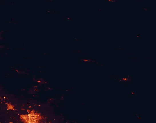 Satellite night-light map of the 100 km around Devils Postpile National Monument, with Clovis, Madera and Bonadelle Ranchos-Madera Ranchos marked