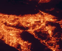Satellite night-light map of the 50 km around Eastvale, with Riverside, Corona and Anaheim marked