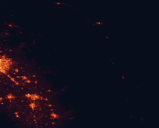 Satellite night-light map of the 100 km around Kings Canyon National Park, with Visalia, Clovis and Tulare marked