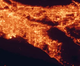 Satellite night-light map of the 50 km around Orange, with Los Angeles, Santa Ana and Anaheim marked