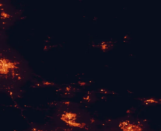 Satellite night-light map of the 100 km around Red Rock Canyon State Park, with Bakersfield, Lancaster and Palmdale marked