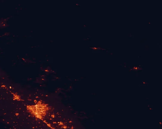 Satellite night-light map of the 100 km around Sierra National Forest, with Fresno, Clovis and Madera marked
