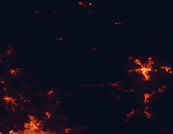 Satellite night-light map of the 100 km around Tahoe National Forest, with Reno, Sparks and Roseville marked