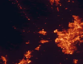 Satellite night-light map of the 50 km around Woodland, with Sacramento, Elk Grove and Davis marked