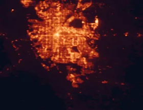 Satellite night-light map of the 50 km around Centennial, with Denver, Aurora and Highlands Ranch marked