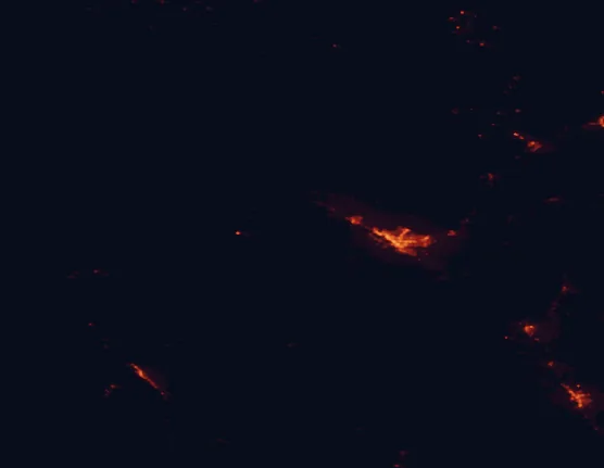 Satellite night-light map of the 100 km around McInnis Canyons National Conservation Area, with Grand Junction, Fruita and Clifton marked