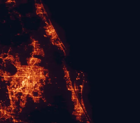 Satellite night-light map of the 100 km around Canaveral National Seashore, with Orlando, Deltona and Titusville marked