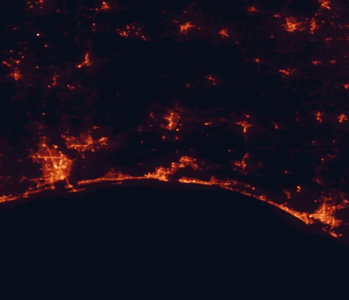 Satellite night-light map of the 100 km around Choctawhatchee National Forest, with East Pensacola Heights, Wright and Pensacola marked