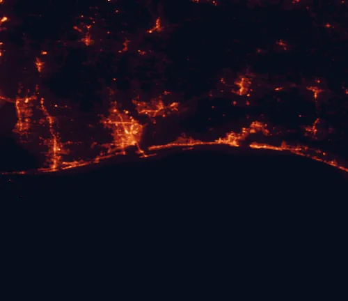 Satellite night-light map of the 100 km around Gulf Islands National Seashore, with East Pensacola Heights, Pensacola and Navarre marked