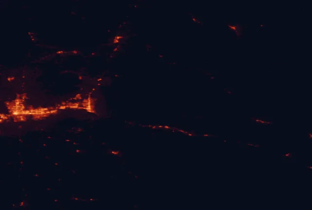 Satellite night-light map of the 100 km around Coeur d'Alene National Forest, with Spokane, Spokane Valley and Coeur d'Alene marked