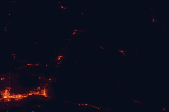Satellite night-light map of the 100 km around Kaniksu National Forest, with Spokane, Spokane Valley and Coeur d'Alene marked