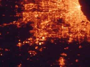 Satellite night-light map of the 50 km around Joliet, with Chicago, Aurora and Naperville marked