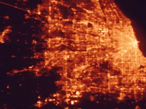 Satellite night-light map of the 50 km around Naperville, with Chicago, Aurora and Joliet marked