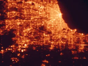 Satellite night-light map of the 50 km around Orland Park, with Chicago, Joliet and Aurora marked