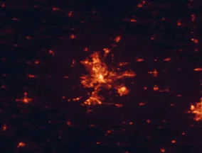 Satellite night-light map of the 50 km around Peoria, with Pekin, Morton and Washington marked