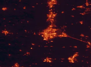 Satellite night-light map of the 50 km around Rockford, with Loves Park, Machesney Park and Janesville marked