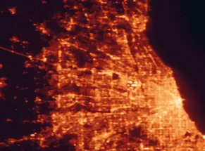 Satellite night-light map of the 50 km around Schaumburg, with Chicago, Aurora and Elgin marked
