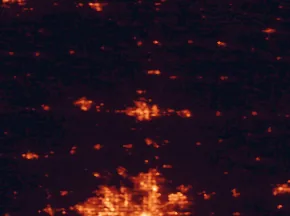 Satellite night-light map of the 50 km around Ames, with Ankeny, Urbandale and Johnston marked