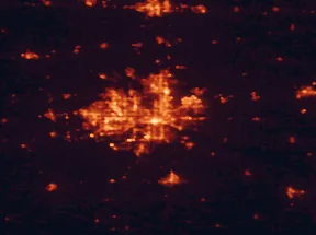 Satellite night-light map of the 50 km around Des Moines, with West Des Moines, Ankeny and Urbandale marked