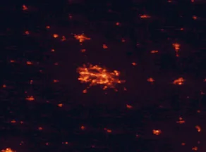 Satellite night-light map of the 50 km around Waterloo, with Cedar Falls, Evansdale and Waverly marked