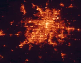 Satellite night-light map of the 50 km around Overland Park, with Kansas City, Kansas City and Olathe marked