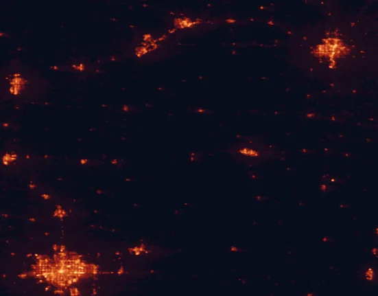 Satellite night-light map of the 100 km around Tallgrass Prairie National Preserve, with Wichita, Topeka and Manhattan marked