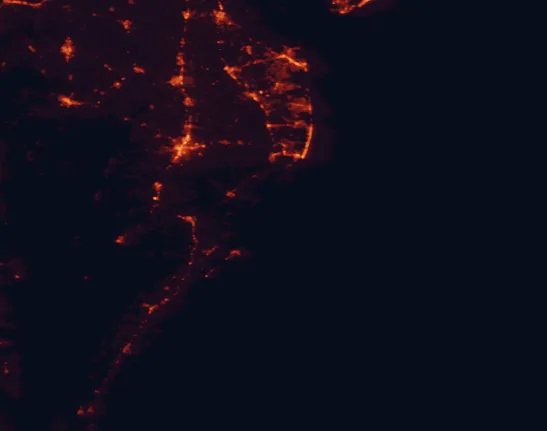 Satellite night-light map of the 100 km around Assateague Island National Seashore, with Salisbury, Ocean Pines and Easton marked