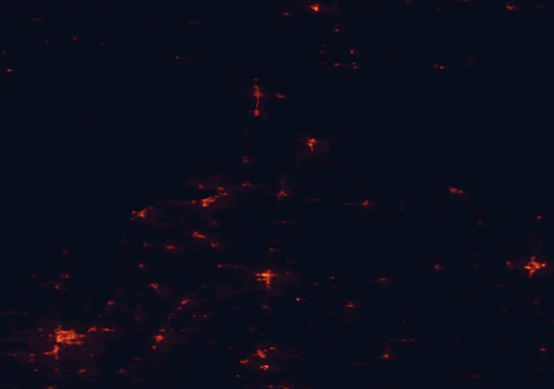 Satellite night-light map of the 100 km around Burt Lake State Park, with Traverse City and Alpena marked