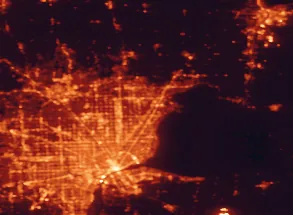 Satellite night-light map of the 50 km around Clinton Township, with Detroit, Sterling Heights and Warren marked