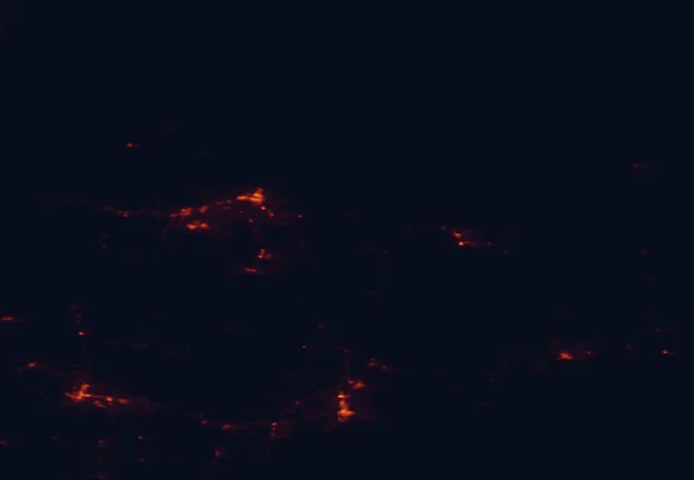 Satellite night-light map of the 100 km around Laughing Whitefish Falls Scenic Site, with Marquette and Escanaba marked