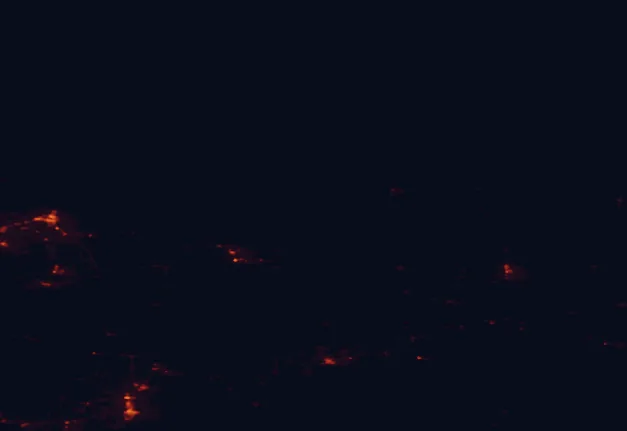 Satellite night-light map of the 100 km around Pictured Rocks National Lakeshore, with Marquette and Escanaba marked