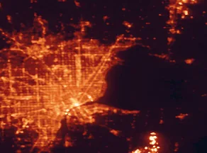 Satellite night-light map of the 50 km around Saint Clair Shores, with Detroit, Windsor and Warren marked