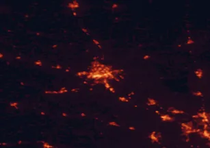 Satellite night-light map of the 50 km around Saint Cloud, with Sartell, Waite Park and Elk River marked