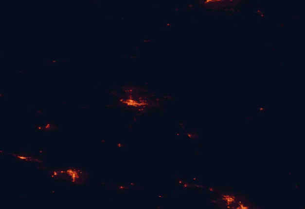 Satellite night-light map of the 100 km around Helena National Forest, with Helena, Butte and Anaconda marked