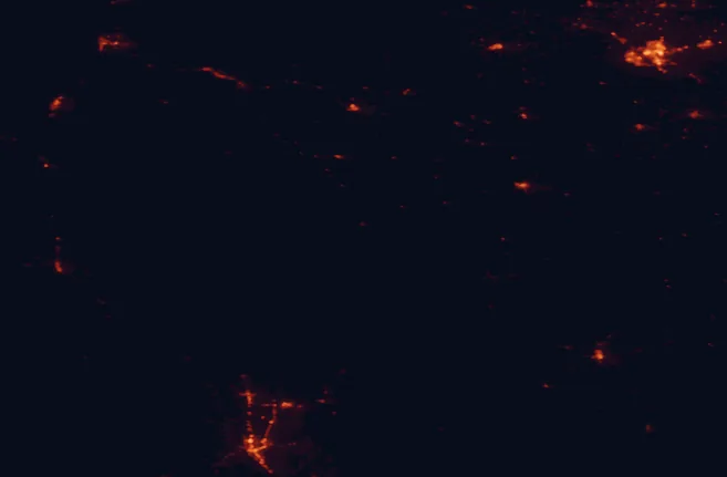 Satellite night-light map of the 100 km around Waterton-Glacier International Peace Park, with Lethbridge, Kalispell and Coaldale marked