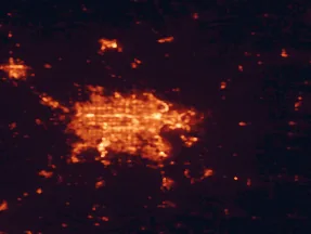 Satellite night-light map of the 50 km around Omaha, with Council Bluffs, Bellevue and Papillion marked