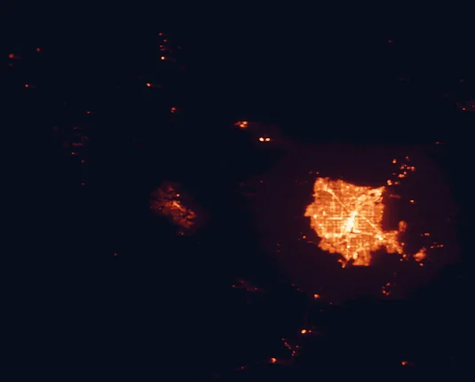 Satellite night-light map of the 100 km around Spring Mountains National Recreation Area, with Las Vegas, North Las Vegas and Henderson marked