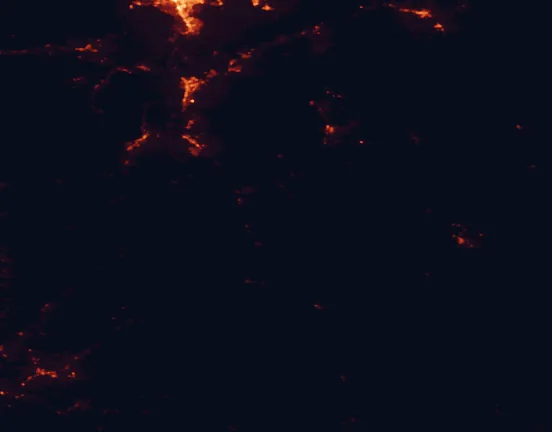 Satellite night-light map of the 100 km around Toiyabe National Forest, with Carson City, South Lake Tahoe and Gardnerville Ranchos marked