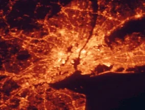 Satellite night-light map of the 50 km around Jersey City, with New York City, Brooklyn and Queens marked