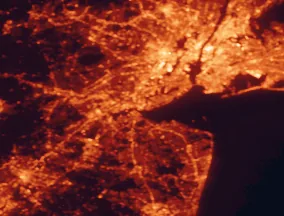 Satellite night-light map of the 50 km around Perth Amboy, with New York City, Brooklyn and Queens marked