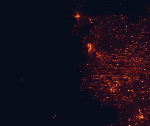 Satellite night-light map of the 100 km around Carlsbad Caverns National Park, with Carlsbad, Artesia and Pecos marked