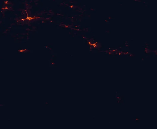 Satellite night-light map of the 100 km around El Malpais National Monument, with Gallup and Grants marked