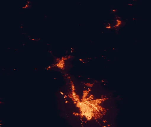Satellite night-light map of the 100 km around Organ Mountains-Desert Peaks National Monument, with Ciudad Juárez, El Paso and Las Cruces marked