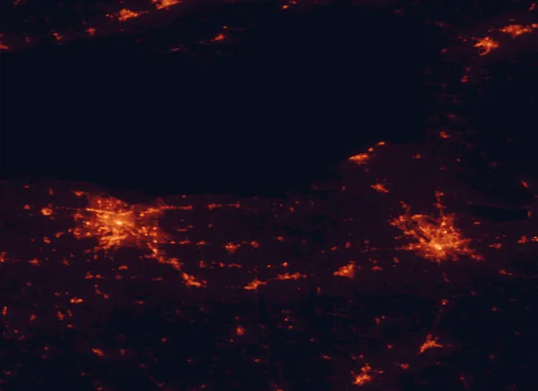 Satellite night-light map of the 100 km around Chimney Bluffs State Park, with Rochester, Syracuse and Clay marked