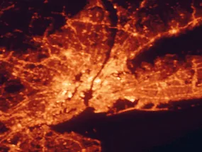 Satellite night-light map of the 50 km around Manhattan, with New York City, Brooklyn and Queens marked